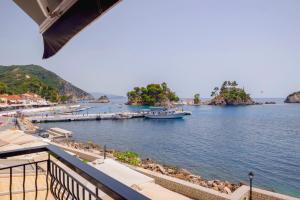 a view of a harbor with boats in the water at Oniro PargaTown Luxury Suites in Parga