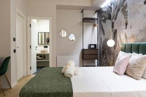 Postel nebo postele na pokoji v ubytování Ammare rooms