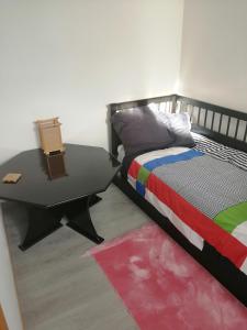 Postel nebo postele na pokoji v ubytování Petit cocon pour 1 personne