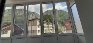 a view of a building from a window in a building at Cazare Herculane in Băile Herculane