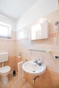 Kúpeľňa v ubytovaní Apartments Gracia