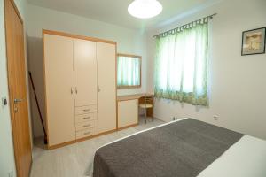 Posteľ alebo postele v izbe v ubytovaní Apartments Gracia