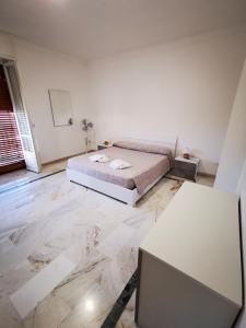 Łóżko lub łóżka w pokoju w obiekcie Casa Buena Vista