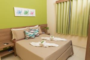 Cama ou camas em um quarto em Pousada Valle Verde