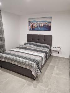 Posteľ alebo postele v izbe v ubytovaní Apartment Cvita in city center