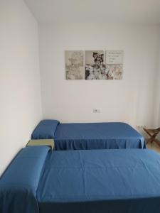 Posteľ alebo postele v izbe v ubytovaní PROALMAR, chalet 17 + 13 fotografií