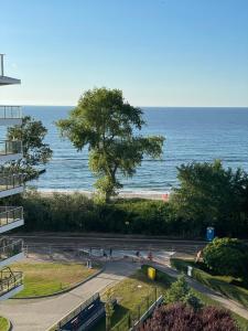 a view of the ocean from a building at ARKA APARTAMENT DELUXE 723b in Kołobrzeg