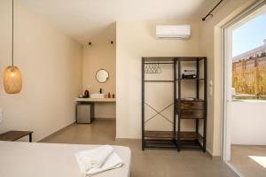 Postel nebo postele na pokoji v ubytování Atma Beach Rooms & Suites