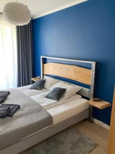 Posteľ alebo postele v izbe v ubytovaní LOFT PEARL Basen Taras Apartament