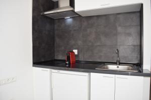 Kuchyňa alebo kuchynka v ubytovaní Hotel Mirablau