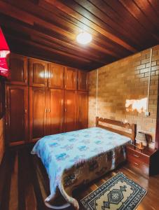 Ein Bett oder Betten in einem Zimmer der Unterkunft Sítio Refúgio Verde