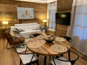 Χώρος καθιστικού στο Appartement Luxe Prince des Cimes Arc 1950 Piscine intérieure et extérieure +16 φωτογραφίες