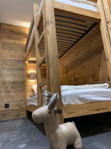 Ένα ή περισσότερα κρεβάτια σε δωμάτιο στο Appartement Luxe Prince des Cimes Arc 1950 Piscine intérieure et extérieure