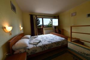 Posteľ alebo postele v izbe v ubytovaní Guesthouse Ante Hodak