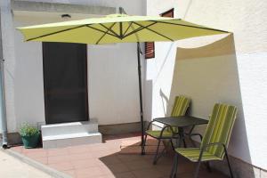 Patio nebo venkovní prostory v ubytování Apartments Kekel