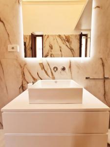 Et badeværelse på Villa Manini suites