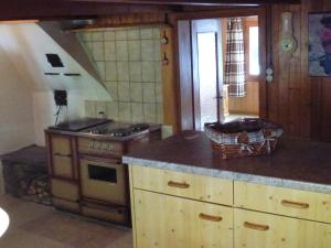 Kuchyň nebo kuchyňský kout v ubytování Ferienwohnung Berner Oberland - Guttannen + 4 fotografie