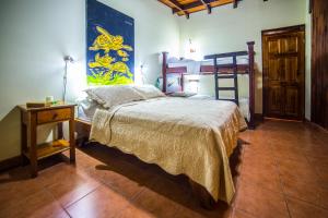 Postel nebo postele na pokoji v ubytování Villas Oasis