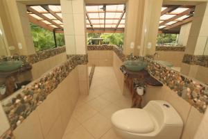 Koupelna v ubytování Villas Oasis
