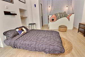 Llit o llits en una habitació de La Sardine du Panier®