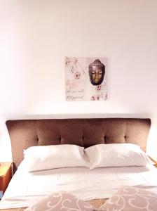 Postel nebo postele na pokoji v ubytování Casa vacanze Pupo centro storico