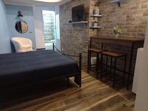 Ένα ή περισσότερα κρεβάτια σε δωμάτιο στο Sea house b&b