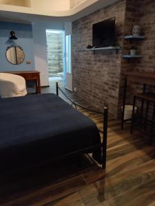 Ένα ή περισσότερα κρεβάτια σε δωμάτιο στο Sea house b&b