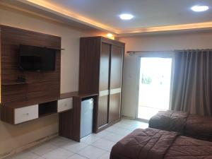 TV a/nebo společenská místnost v ubytování Al Deyafa Hotel