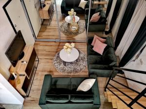 Posezení v ubytování Deluxe Loft Studio Apartment