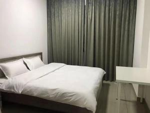 Postel nebo postele na pokoji v ubytování Wehome 忆江南民宿