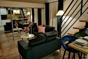 Posezení v ubytování Deluxe Loft Studio Apartment