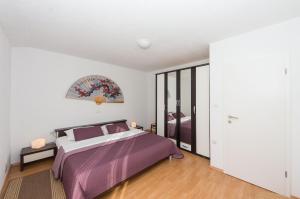 Postel nebo postele na pokoji v ubytování Apartment Yasmin