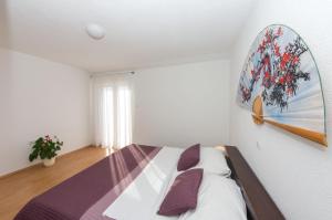 Postel nebo postele na pokoji v ubytování Apartment Yasmin
