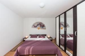 Postel nebo postele na pokoji v ubytování Apartment Yasmin