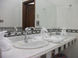 Koupelna v ubytování Al Hambra Hotel
