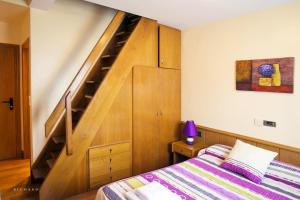 Postel nebo postele na pokoji v ubytování Hostal Musunzar