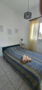 Postel nebo postele na pokoji v ubytování Villa CHRISTINA