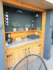 a kitchen with a counter with a bike in front of it at Room eleven in Veliko Tŭrnovo