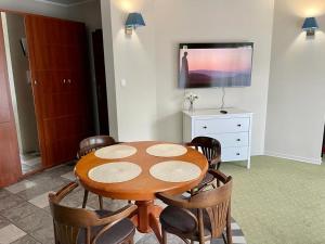 TV a/nebo společenská místnost v ubytování Apartamenty Residence Borkowo