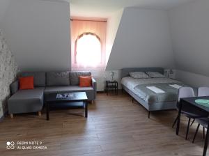 Apartamenty Brzozowe Zacisze客房内的一张或多张床位