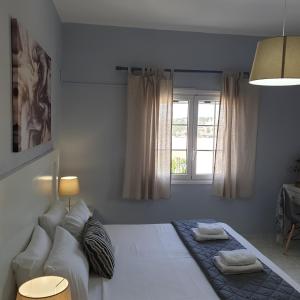 Llit o llits en una habitació de Sivotahomes-blu