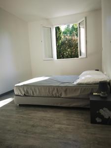 Postel nebo postele na pokoji v ubytování Charmante maison de vacances avec piscine