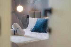 Postel nebo postele na pokoji v ubytování Ammare rooms