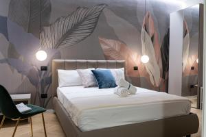 Postel nebo postele na pokoji v ubytování Ammare rooms + 37 fotografií