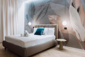 Postel nebo postele na pokoji v ubytování Ammare rooms