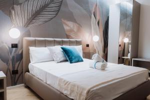 Postel nebo postele na pokoji v ubytování Ammare rooms