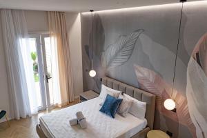 Postel nebo postele na pokoji v ubytování Ammare rooms