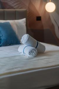 Postel nebo postele na pokoji v ubytování Ammare rooms