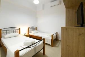 Фотография из галереи Dinos Apartments в Василиках +22 фотографии