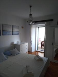 Postel nebo postele na pokoji v ubytování Studio Apartman LENESTA